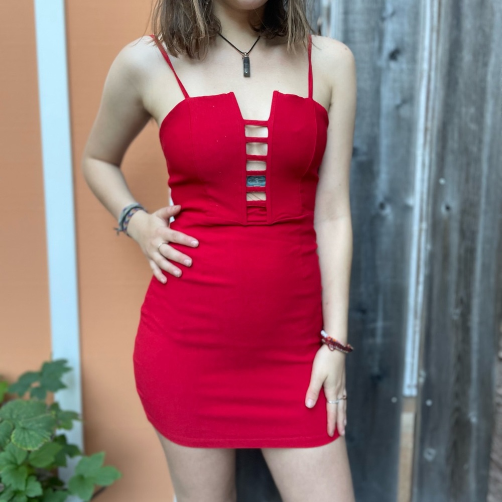 Red bodycon dress with chest cutouts